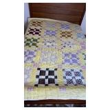 Hand made square pattern quilt