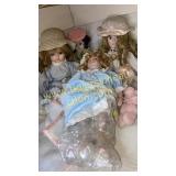 4 porcelain dolls