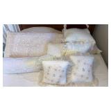 Pile of decorative pillows and others