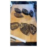 Group of sad irons and trivets
