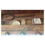 Iron tongs and Hershey tin