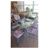 Wrought iron patio table and 4 chairs