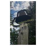 Cast iron bell on post