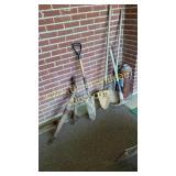 Singe trees shovels and pick