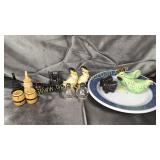 7 vintage salt and pepper shakers on Pyrex dish-