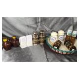 6 vintage salt and pepper shakers on pie plate