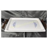Corningware broil/bake tray on metal and wood
