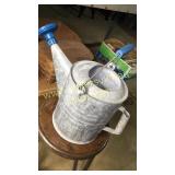Galvanized water can