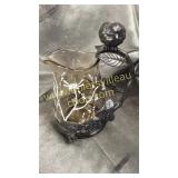 Hand painted creamer with silverplate bird handle