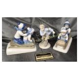 Ice skater and sled figurines