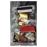 Large tin of costume jewelry