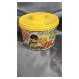 Vintage 1961 candy tin with casters