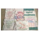 6 old seed sacks