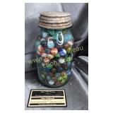 Blue quart jar with marbles