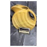 Yellow slant pitcher