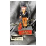 Vintage plastic Uncle Sam mechanical bank works