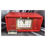 Vintage red Sylvania clock radio- clock works,