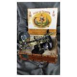 Cigar box, magnifying glass, stamp