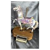 Musical carousel horse
