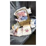 Vintage Hand embroidered linens in gold basket