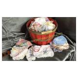 Vintage handkerchiefs in red garden basket-hand
