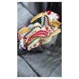 Large group of crocheted trivets in bundt pan