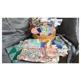 Basket of quilting squares and others mostly hand