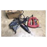 Box with jigsaw sander and drill