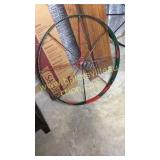 Green and red iron wagon wheel 30in
