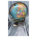 Vintage school globe on metal frame