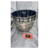 Stack of aluminum Bundt pans