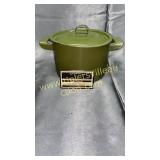 Green enamel over cast pot