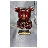 Brown drip sitting pig bank