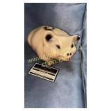 Old chalk piggy bank