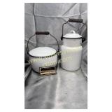 Blue and white enamel ware pails