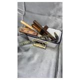 Old tools and utensils in enamel ware pan