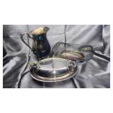 Silverplate pitcher and serving pieces