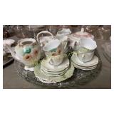 Collection of dishes and shakers on platter