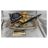 Group with tape dispenser, carved letter opener,