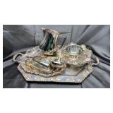 Silverplate serving trays, ladle, pitcher, etc