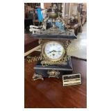 Heavy marble case clock with gold tone decoration
