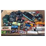 Box of toy cars and trucks