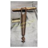 Old iron and wood barrel lauger