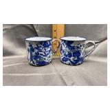 2 blue swirl enamel ware mugs