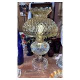 Converted oil lamp with amber shade