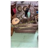 Vintage kitchen utensils in small crate