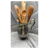 Silverplate pitcher with wooden spoons