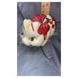 Glazed pottery piggy bank red flowers