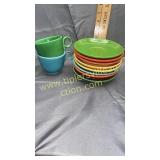 9 fiesta saucers and 2 cups