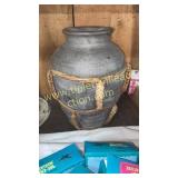 Pottery vase with rattan detail
